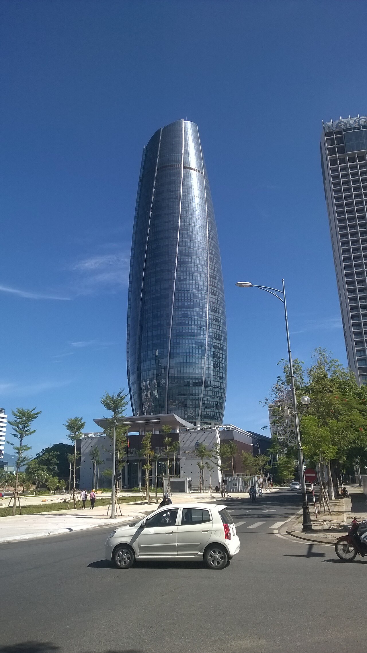The Da Nang Administrative Center tower seen from street level against the sky