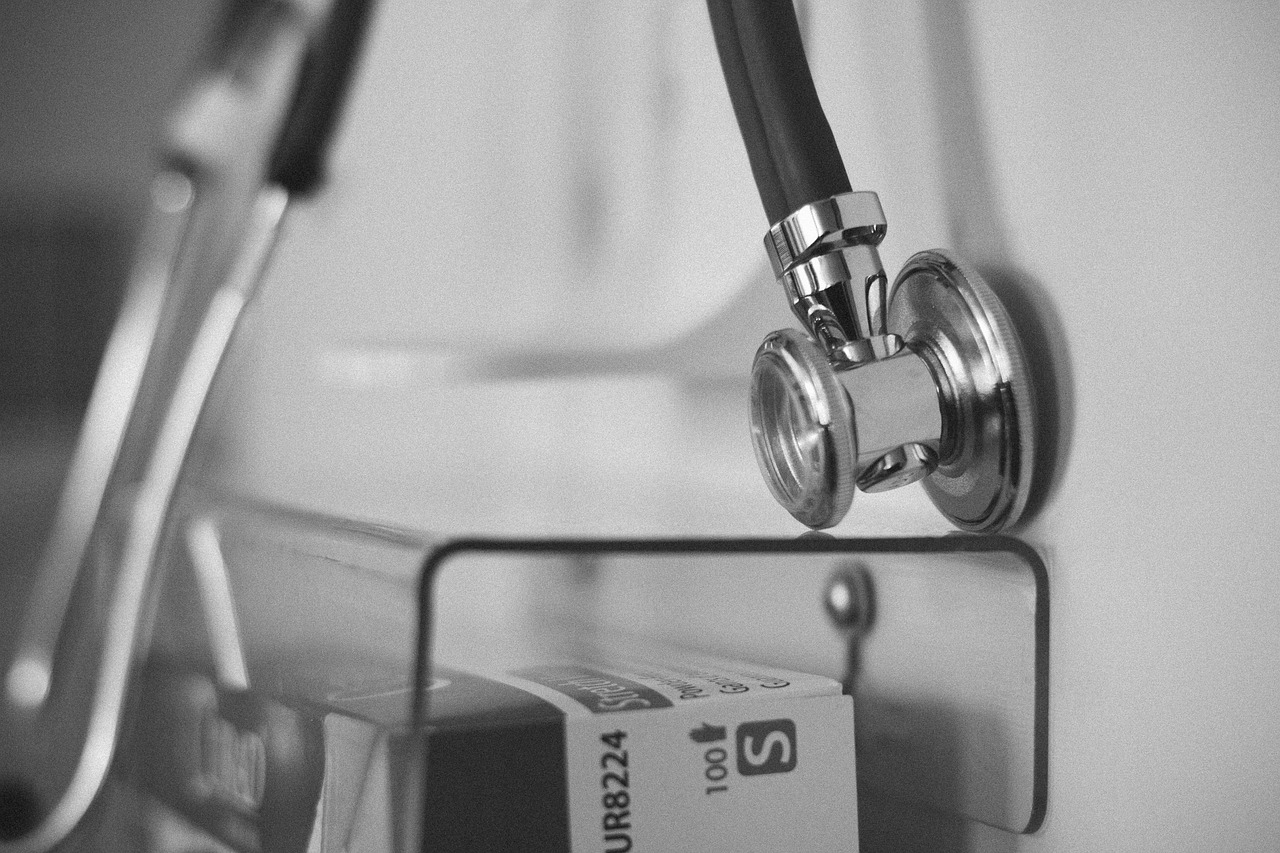 Stock photo of a stethoscope hanging on a hospital wall